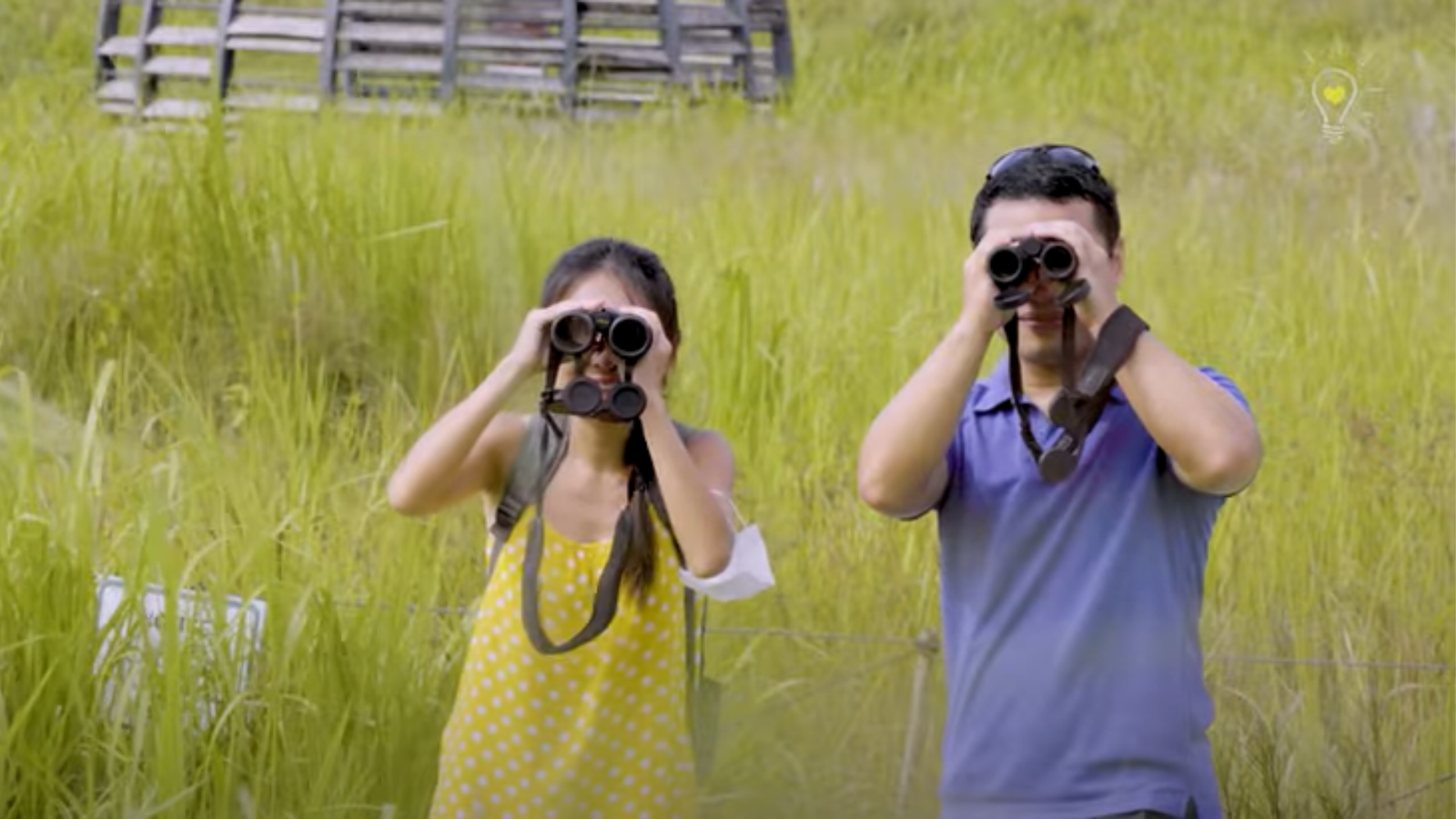 Screencap of Biogirl MJ in a Singaporean garden in one of their YouTube videos